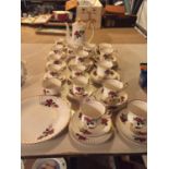 A COLLECTION OF LUBERN 22KT GOLD BONE CHINA TO INCLUDE COFFEE POT, CREAM JUGS, SUGAR BOWLS, CUPS AND