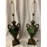 A PAIR OF LARGE GREEN URN SHAPED TABLE LAMPS WITH TWIN HANDLES IN THE FORM OF INTERTWINED SNAKES H: