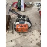 A STIHL PETROL LEAF BLOWER AND A FURTHER BATTERY POWERED DRILL