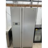 A SILVER LG AMERICAN STYLE FRDIGE FREEZER BELIEVED IN WORKING ORDER BUT NO WARRANTY