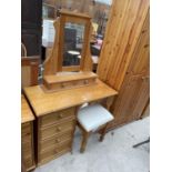 A PINE DRESSING TABLE AND STOOL
