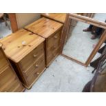 A PAIR OF PINE BEDSIDE CHESTS AND A MIRROR