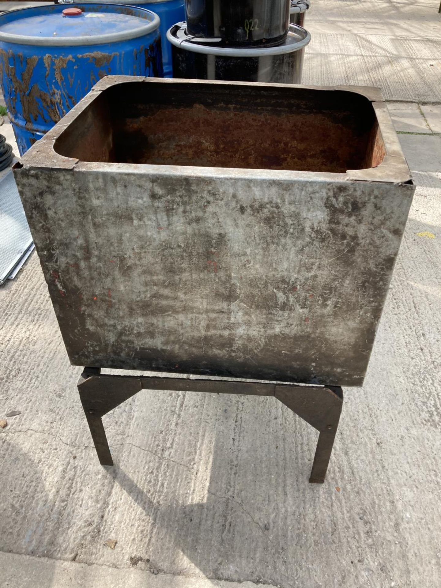 A GALVANISED WATER TANK ON A STAND NO VAT