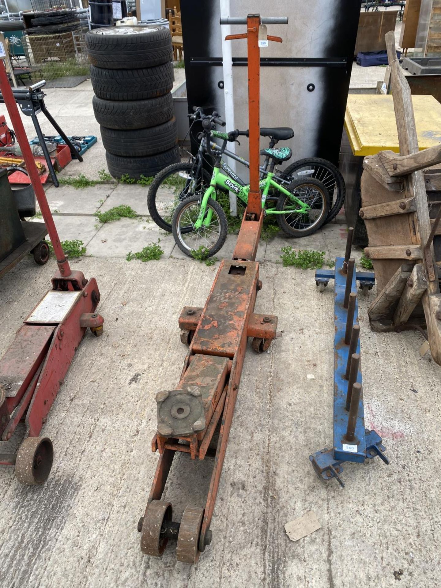 A LARGE INDUSTRIAL TROLLEY JACK + VAT