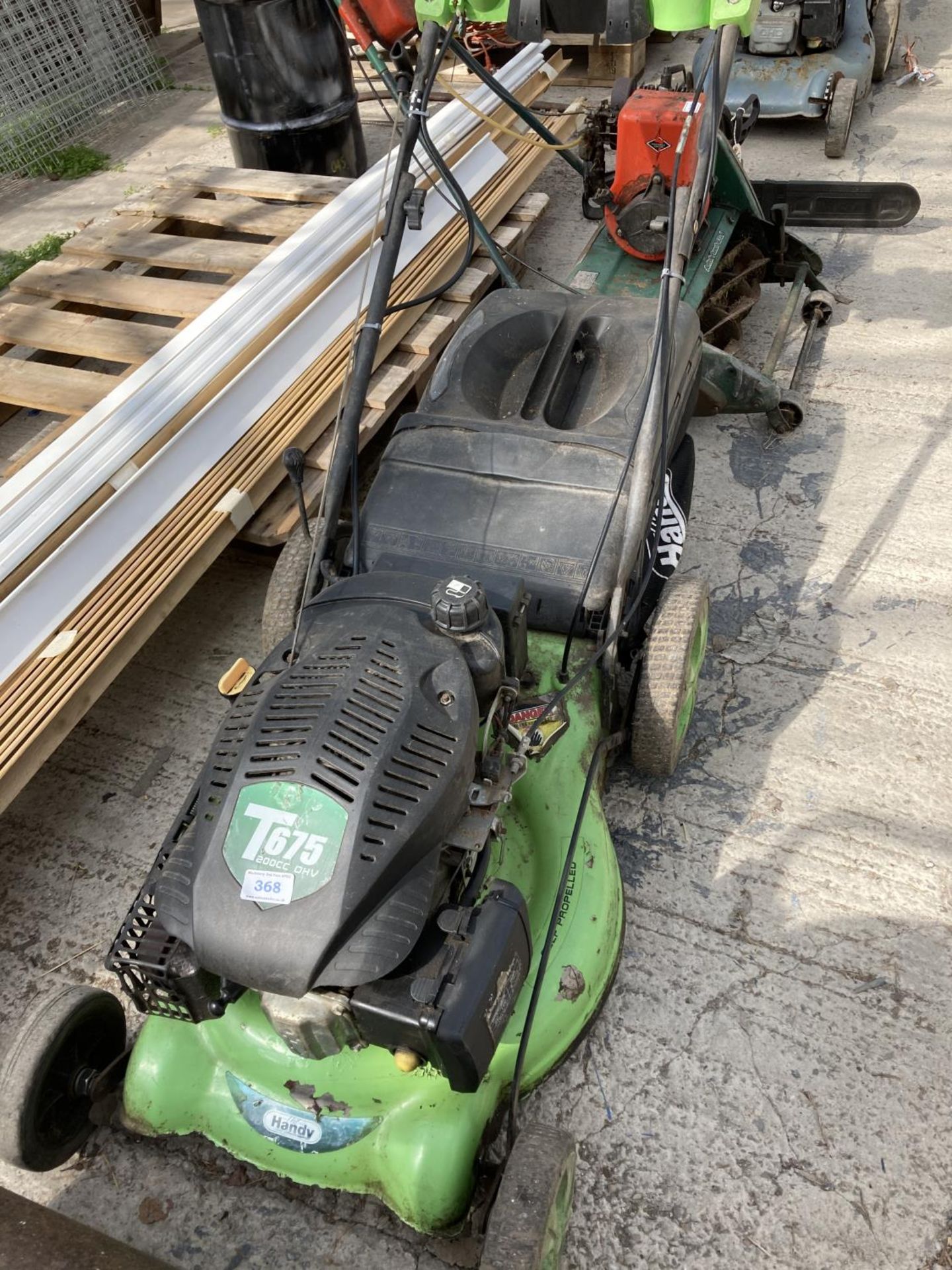 THE HANDY ELECTRIC START PETROL LAWN MOWER BELIEVED WORKING BUT NO WARRANTY no vat