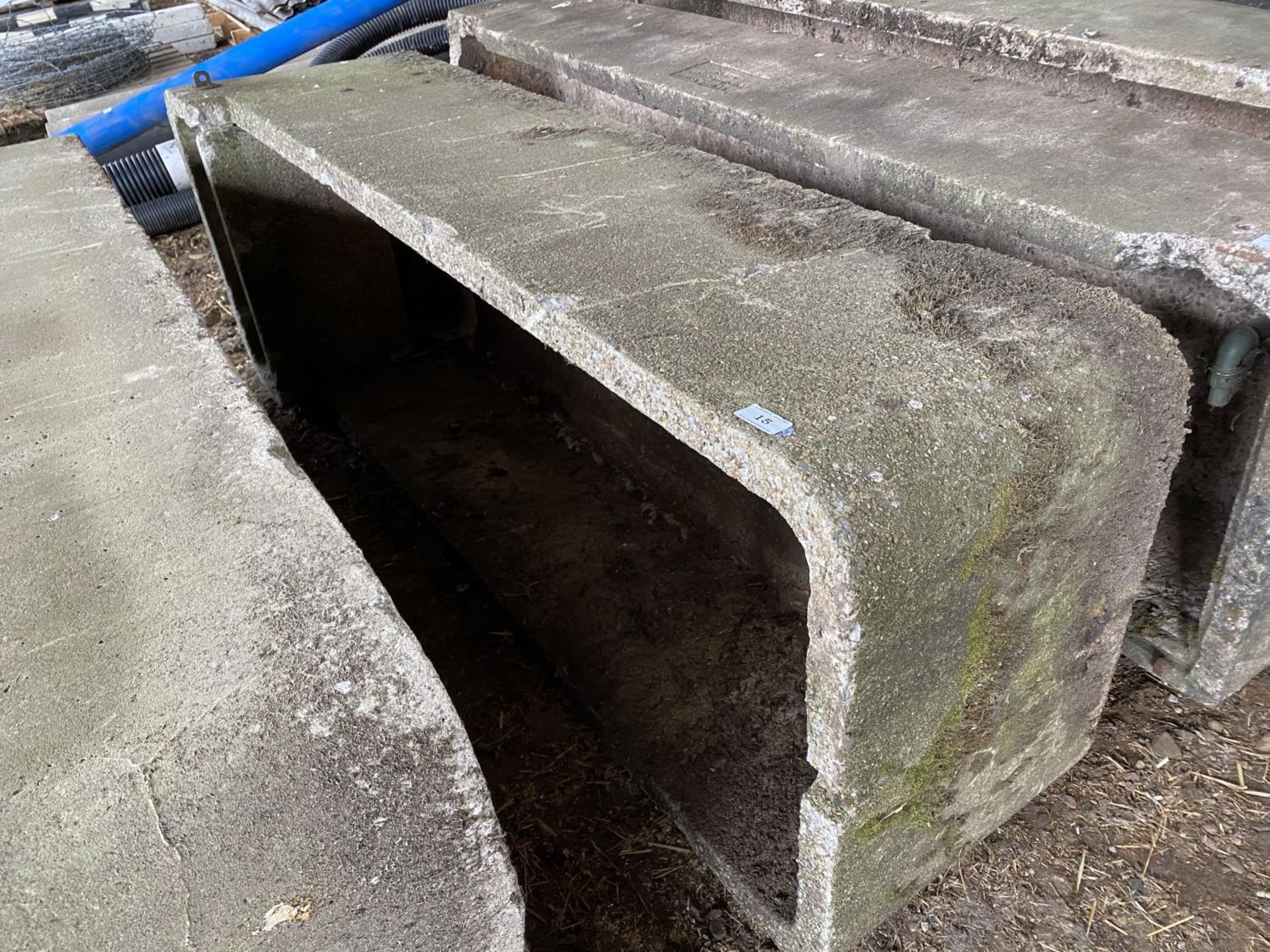 A CONCRETE CATTLE WATER TROUGH 6' 6" LONG, 2' 2" WIDE 18" HIGH