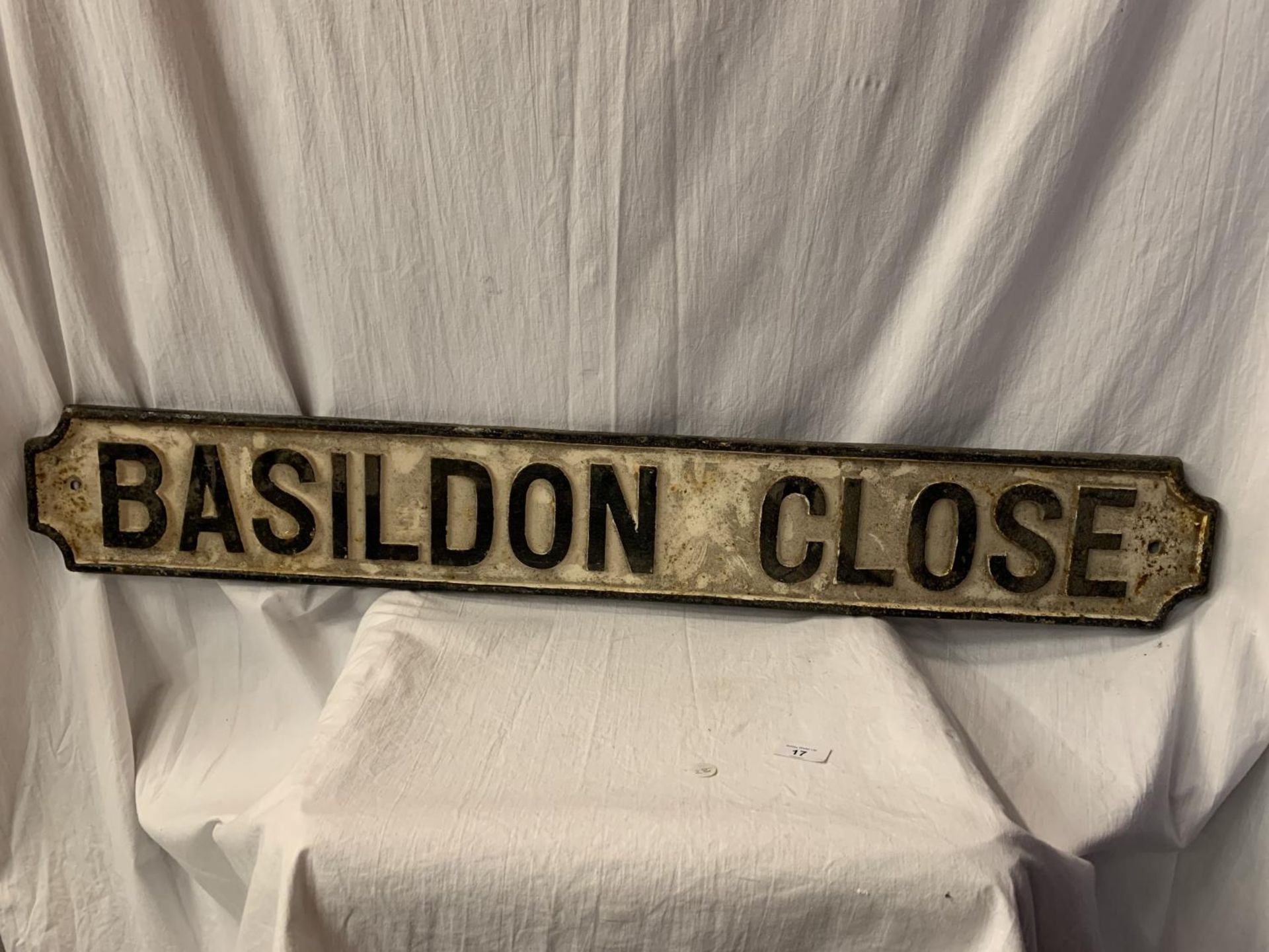 A CAST METAL STREET SIGN 'BASILDON CLOSE' 110CM X 15CM