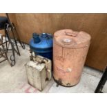 TWO VINTAGE OIL DRUMS AND A FURTHER VINTAGE VALOR FUEL CAN