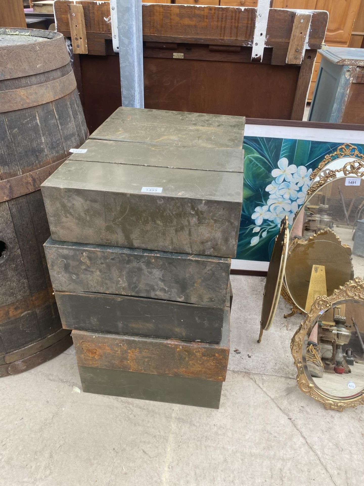 A GROUP OF TEN METAL STORAGE TINS