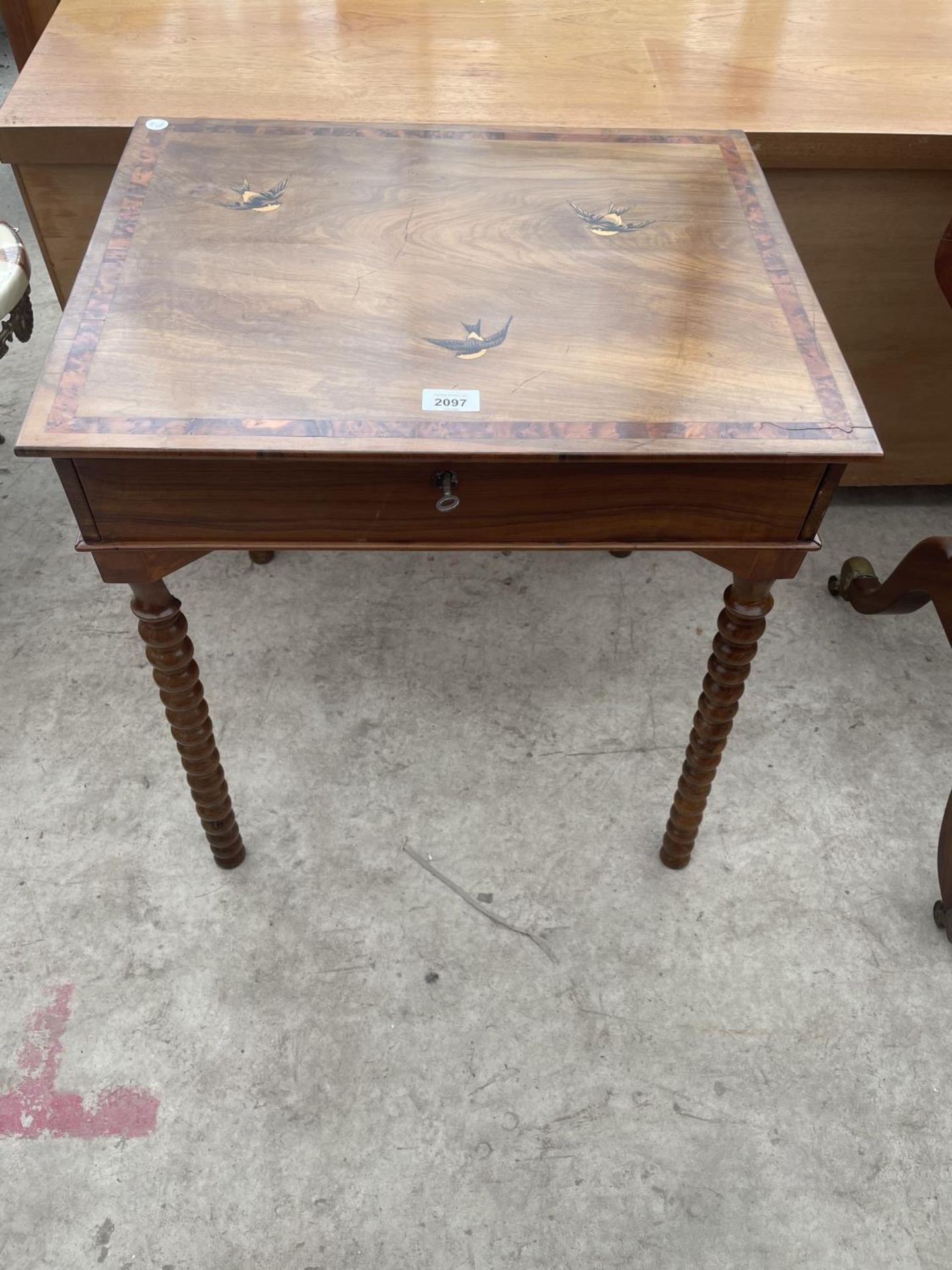 A SMALL WALNUT AND INLAID TABLE WITH SWALLOW DECORATION ON TURNED LEGS WITH SINGLE DRAWER, 22X17.5"