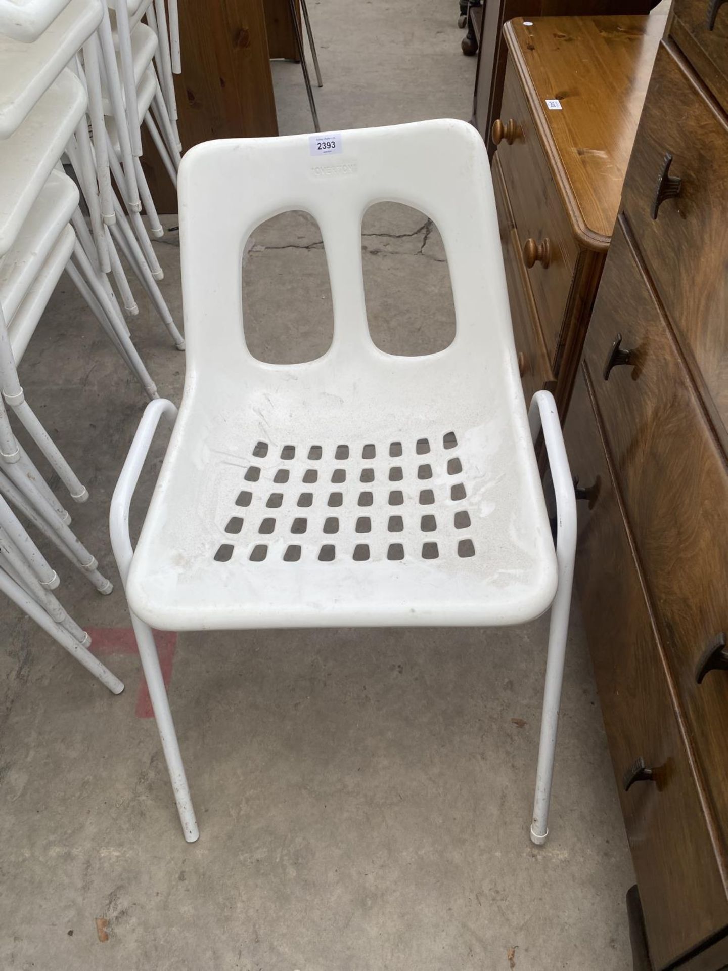 SIX 'OVERTON' WHITE PLASTIC STACKING CHAIRS