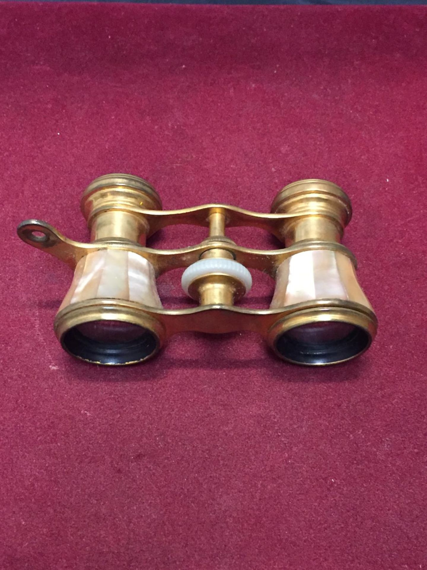 A PAIR OF BRASS AND MOTHER OF PEARL OPERA GLASSES