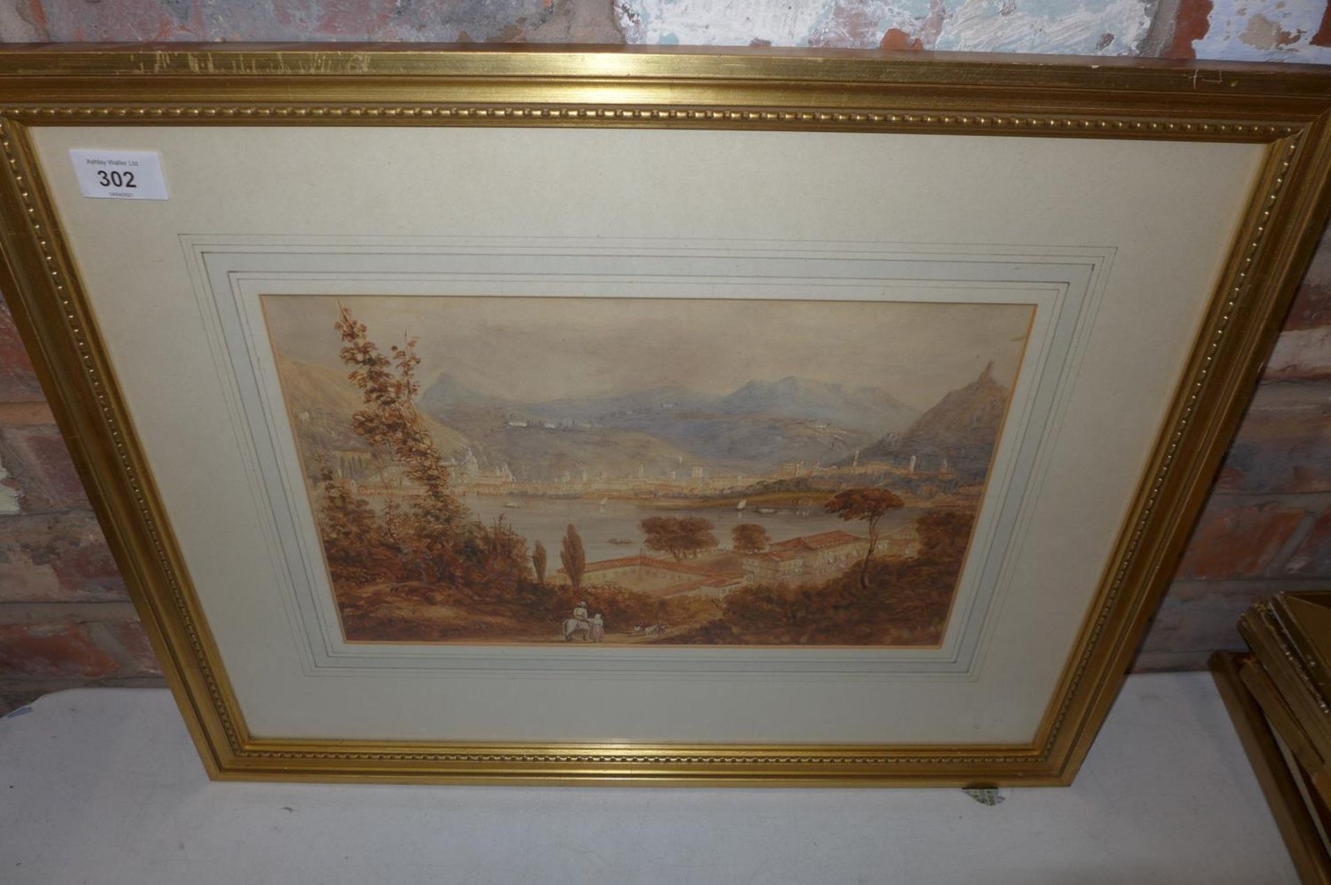 A LATE 19TH/EARLY 20TH CENTURY WATERCOLOUR OF A CONTINENTAL LAKE SCENE, 23X36CM