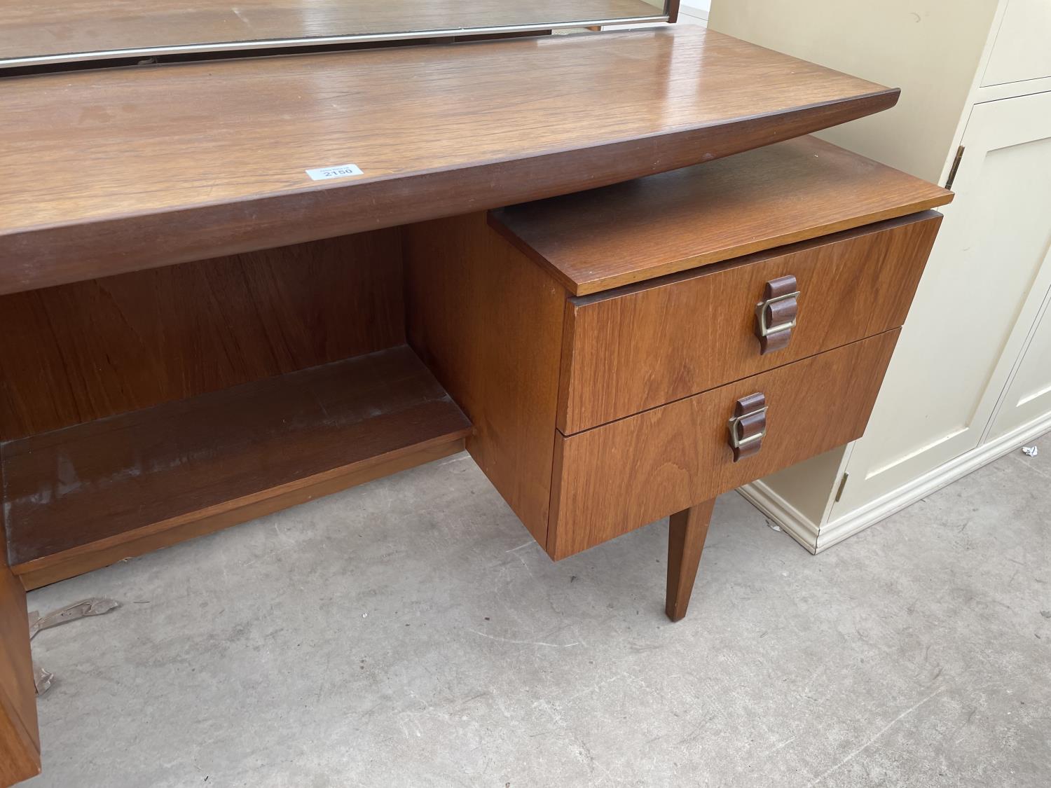 A RETRO TEAK DRESSING TABLE ENCLOSING FOUR DRAWERS WITH BELT BUCKLE STYLE HANDLES, 60" WIDE - Image 5 of 5