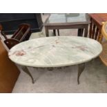 AN OVAL ONYX EFFECT COFFEE TABLE, 36X18"