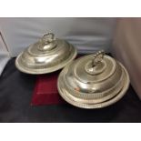 TWO SILVER PLATED LIDDED SERVING DISHES WITH A CREST