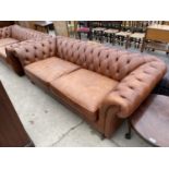 A TAN LEATHER LOW BACK TWO SEAT CHESTERFIELD SOFA