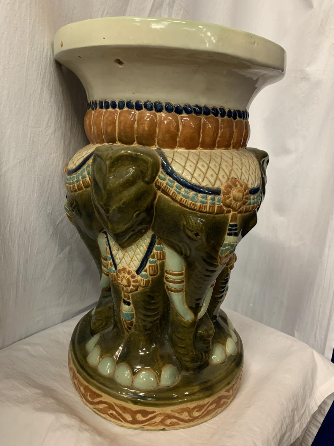 A LARGE CERAMIC JARDINIERE DECORATED WITH AN ELEPHANT THEME H:50.5CM