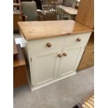 A MODERN PAINTED TWO DOOR CABINET WITH PINE TOP, 36" WIDE