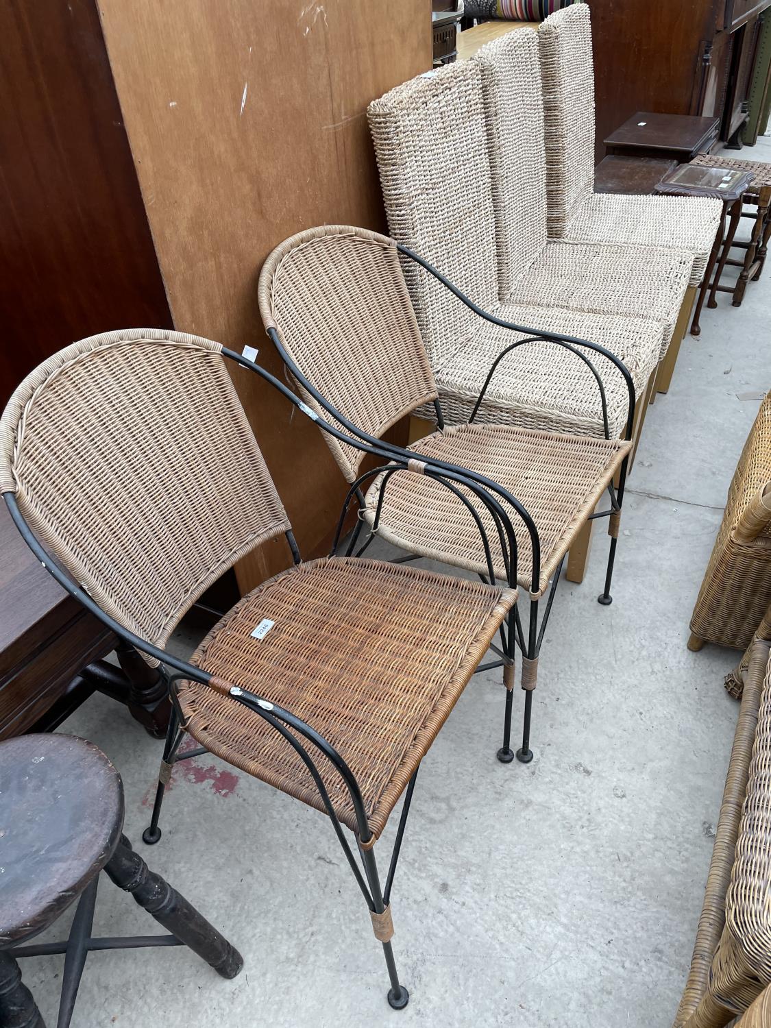 A PAIR OF STYLISH METALWARE FRAMED CONSERVATORY ELBOW CHAIRS WITH WICKER SEATS AND BACKS, TOGETHER