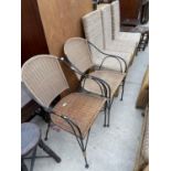 A PAIR OF STYLISH METALWARE FRAMED CONSERVATORY ELBOW CHAIRS WITH WICKER SEATS AND BACKS, TOGETHER