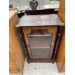 A VICTORIAN WALNUT PIER CABINET WITH EBONISED COLUMNS