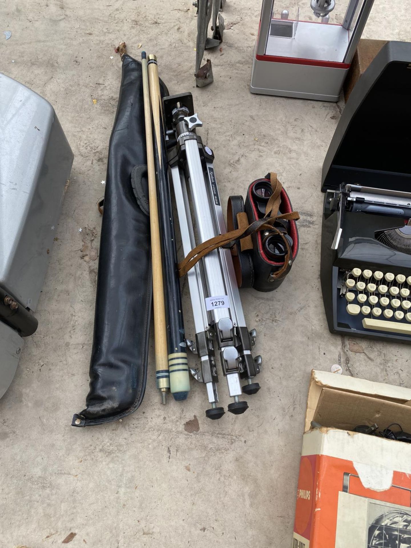 A CAMERA TRIPOD, A PAIR OF BINOCULARS AND A POOL CUE ETC