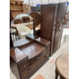 A MID 20TH CENTURY OAK DRESSING TABLE AND WARDROBE