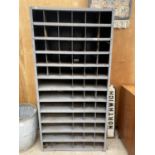 A VINTAGE 58 SECTION PIGEON HOLE STORAGE RACKING
