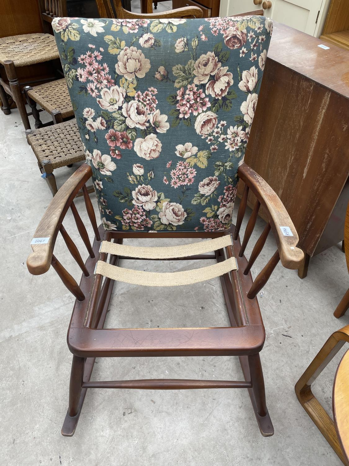 A PARKER KNOLL STYLE ROCKING CHAIR