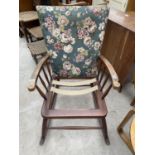 A PARKER KNOLL STYLE ROCKING CHAIR