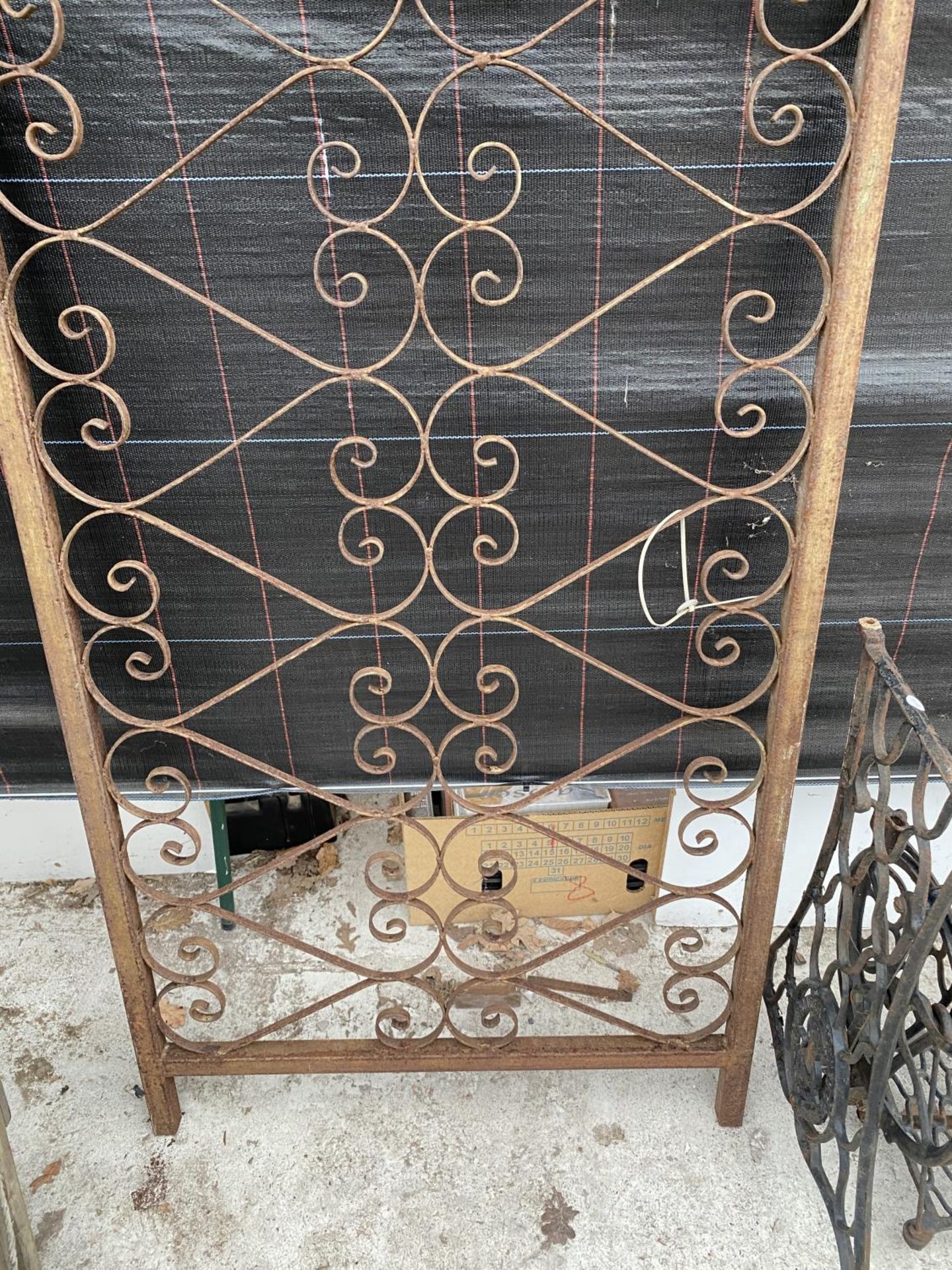 A SECTION OF DECORATIVE WROUGHT IRON RAILING AND A SINGER TREADLE BASE - Image 5 of 5