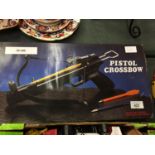 A BOXED PISTOL CROSSBOW