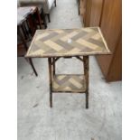 A VICTORIAN TWO TIER BAMBOO CENTRE TABLE, 14X21"