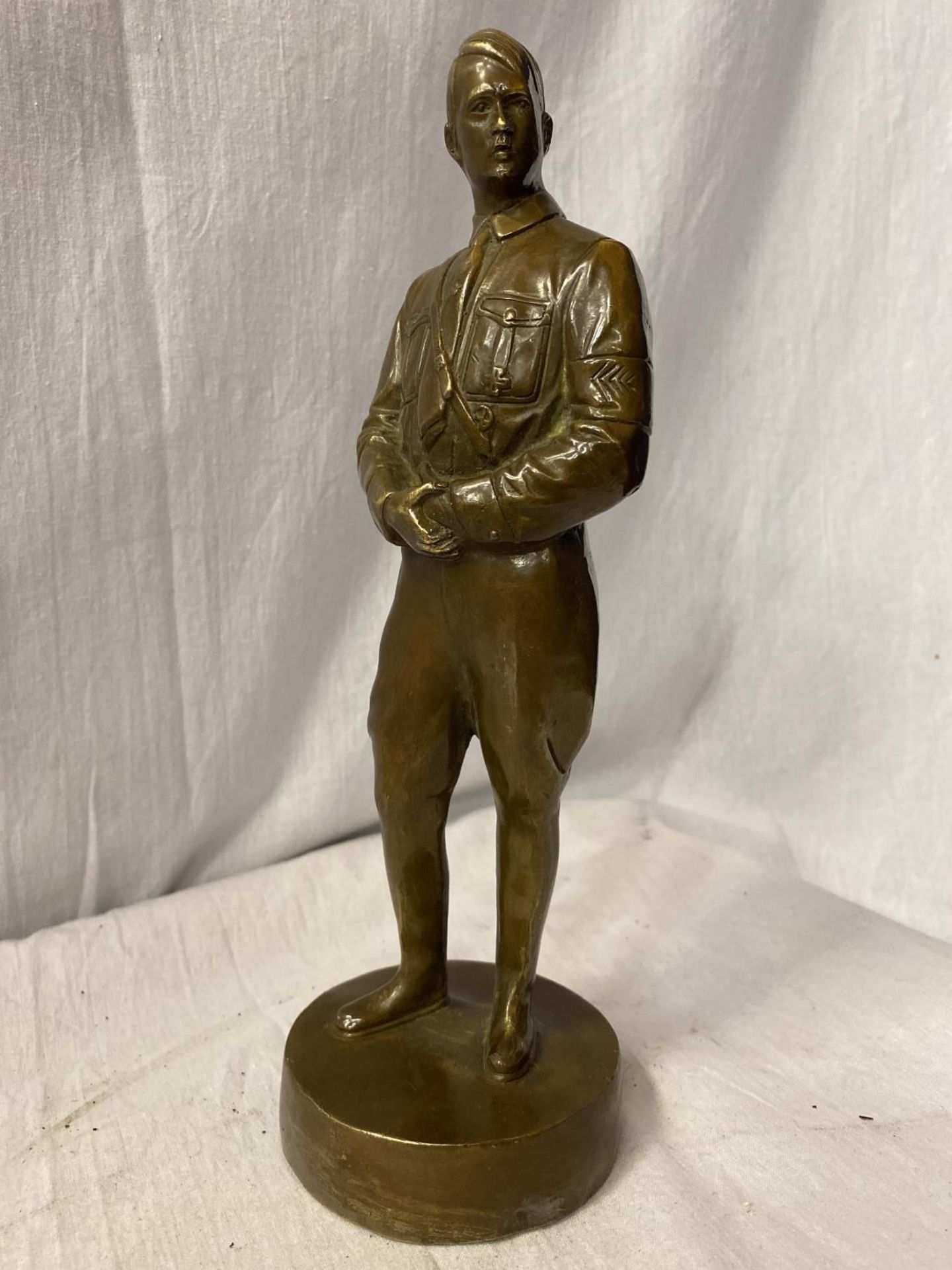 A BRONZE FIGURE IN THE FORM OF ADOLF HITLER H: 27CM