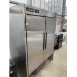 A LARGE INDUSTRIAL KITCHEN FRIDGE