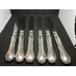 SIX SILVER HANDLED KNIVES MARKED 800