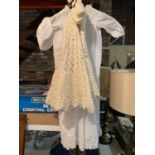 A VINTAGE LINEN CHRISTENING GOWN WITH BONNET AND A KNITTED SHAWL WITH BONNET