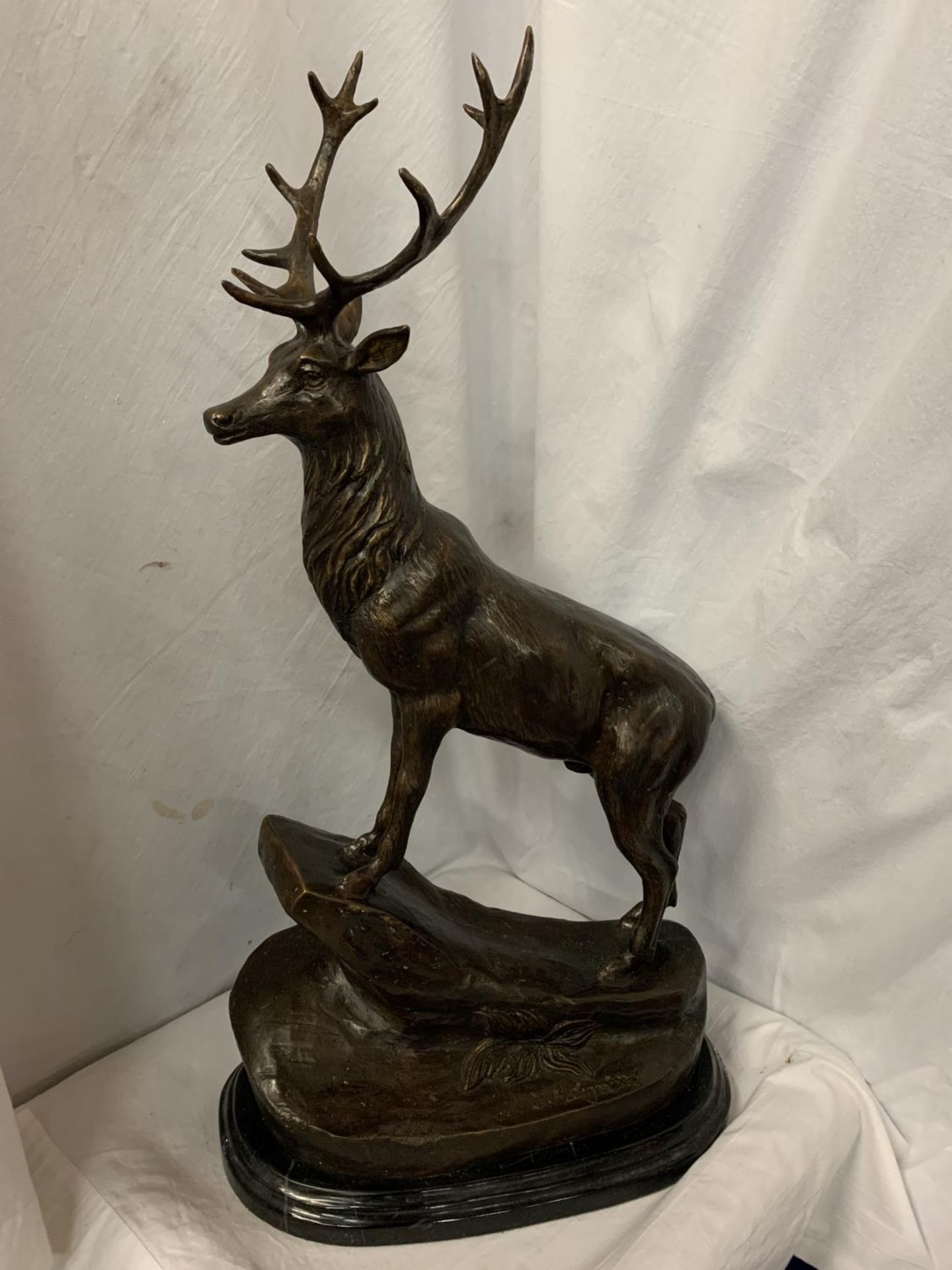 A LARGE BRONZE STAG MOUNTED ON A MARBLE BASE SIGNED J MOIGNIEZ H: 68.5CM