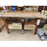 A VINTAGE WORK BENCH WITH LOWER SHELF AND A RECORD NO.55 BENCH VICE