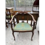 AN EDWARDIAN MAHOGANY AND INLAID TUB CHAIR