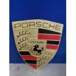 A LARGE CAST METAL 'PORSCHE' SIGN - H:96 CM W:73 CM