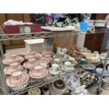 AN ASSORTMENT OF CERAMIC WARE TO INCLUDE TRIOS, CUPS AND SAUCERS ETC