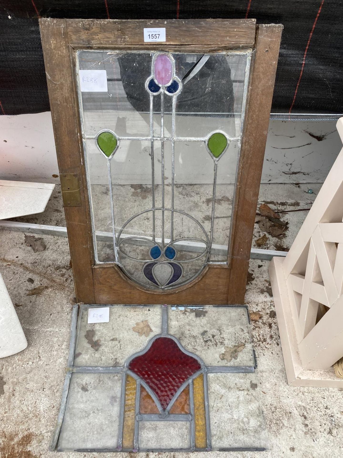 TWO STAIN GLASS WINDOWS (ONE WITH WOODEN FRAME)