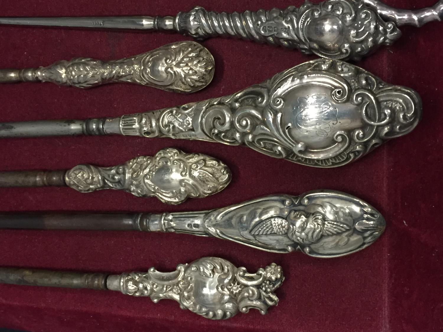 FOUR SHOE HORNS, SIX BUTTON HOOKS AND A PAIR OF SCISSORS ALL WITH HALLMARKED HANDLES - Image 2 of 4