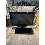 A 42" LG TELEVISION AN A SONY SOUND BAR BELIEVED WORKING BUT NO WARRANTY