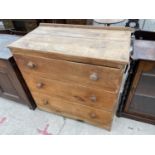 A VICTORIAN PINE CHEST OF THREE GRADUATED DRAWERS W: 39 INCHES