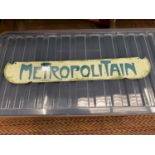 A METAL 'METROPOLITAIN' SUBWAY SIGN - 60.5CM X 9.5CM