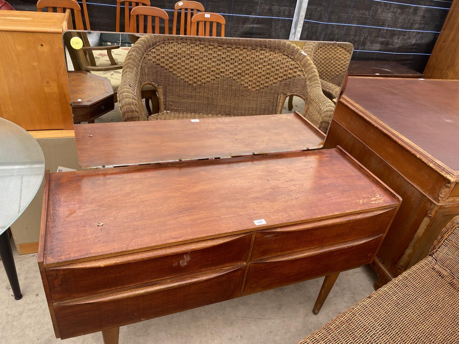 A RETRO TEAK SCHREIBER STYLE DRESSING TABLE WITH FOUR DRAWERS, 48" WIDE