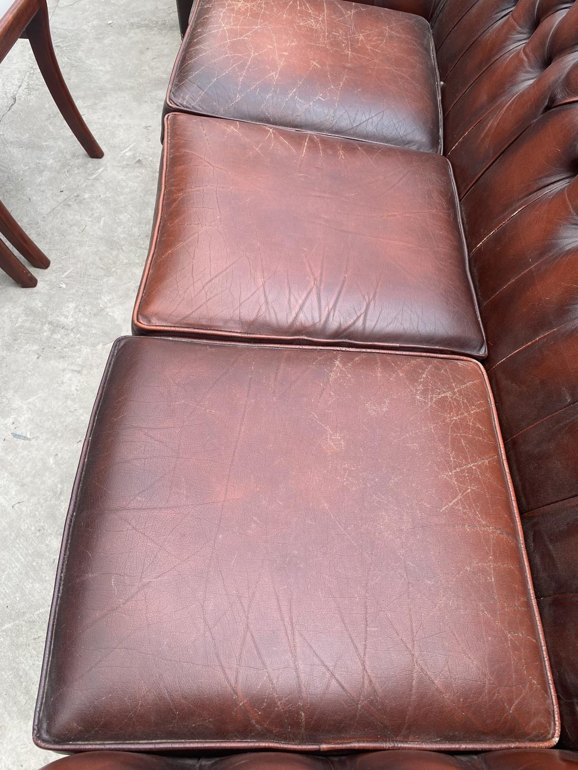 AN OXBLOOD 3 SEATER BUTTON BACK SETTEE - Image 4 of 5